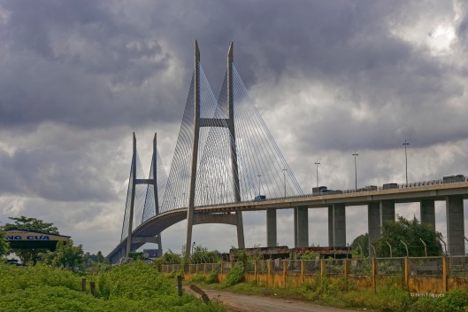Mỹ Thuận bridge crossing a branch of Mekong river between Vĩnh Long and Cần Thơ.